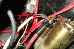 109 spark plug wires looped over starter - not routed correctly and missing the shielding to hold them back - may not be able to do this as factory but we will clean it up some
