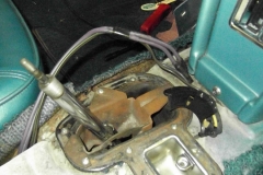 118 shifter console removed - note wiring for NSS is tucked under carpet, switch is broken and stuck under carpet
