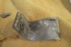 196 RH window regulator was broken - this piece found in door