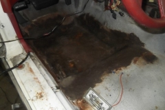 241 floorboard on LH is rotten and has been glassed over