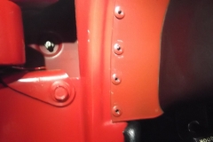 109 door jamb and dash end tab color is different - note wear around the rivets