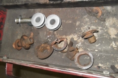 119 old trailing arm bushing removed compared to new bushing ready to go in