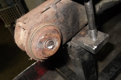125 LH side old bushing with cut off seized bolt in place