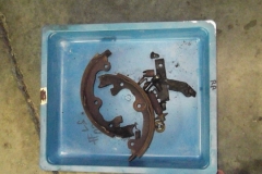 114 RH parking brake hardware removed