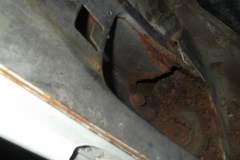 326 LH body mount in door hinge heavily rusted