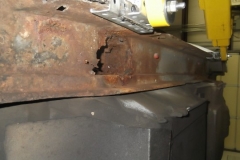 340 rust hole at LH rocker panel under the door hinge