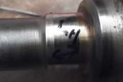 202 LH rear axle worn at outboard bearing contact