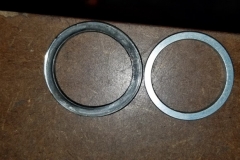 156 incorrect shim on RH was too large in diameter for RH wheel bearing