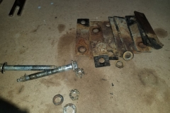 125 old T arm shims and bolts removed