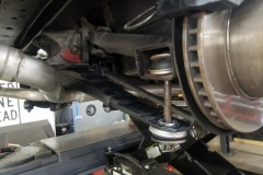 208 leaf spring installed - end link bushing retainers crimped in