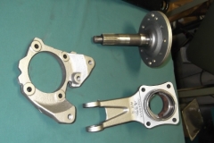 124 RH axle, caliper bracket, and bearing housing ready for assembly