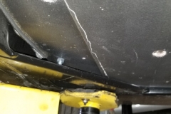 107 cracks in underbody at LH seat