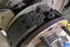 159 parking brake at RR with evidence of brake or rear wheel bearing grease leak